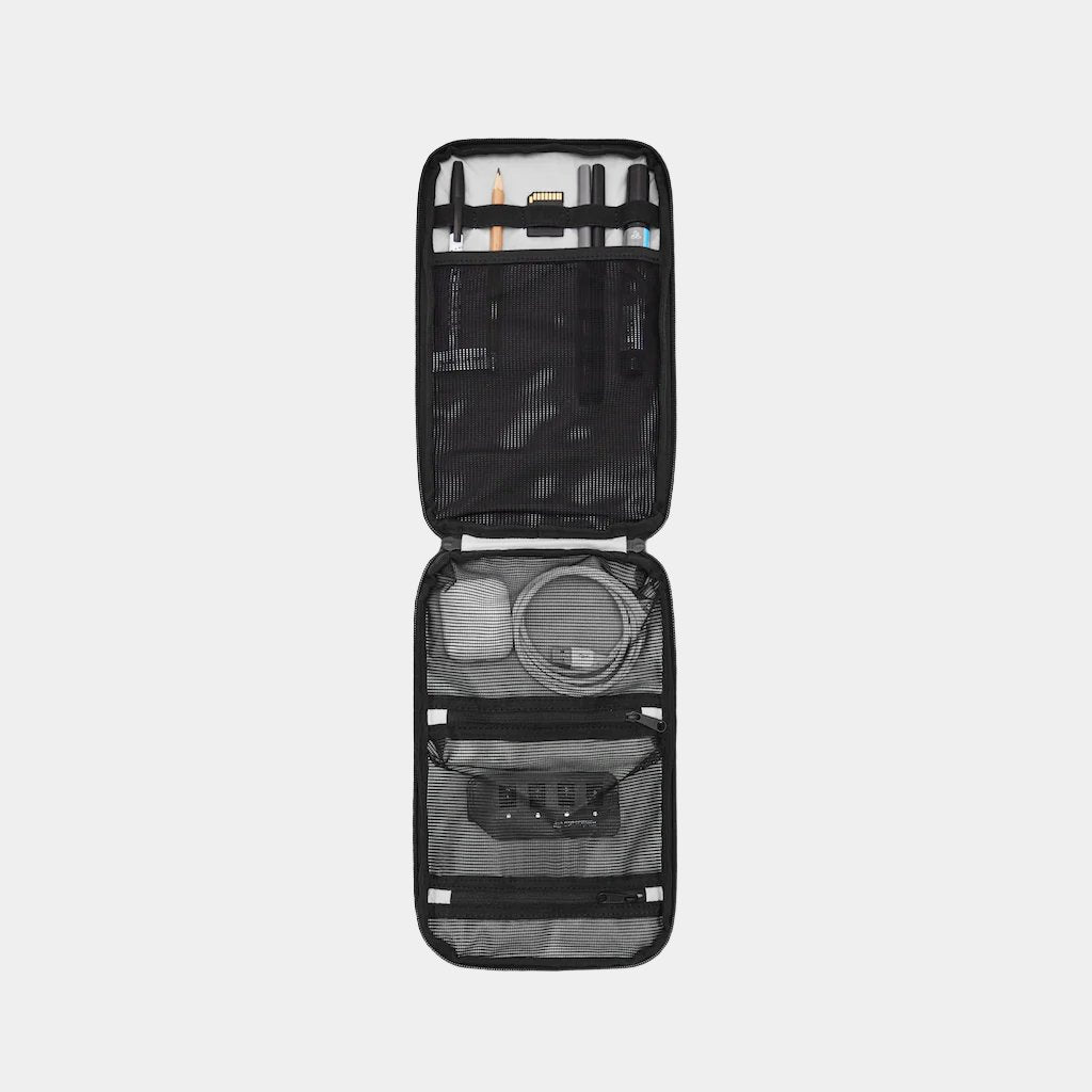 "MODERN DAYFARER Tech Pouch RVX25 - The perfect solution for keeping your tech essentials organized and easily accessible on-the-go."