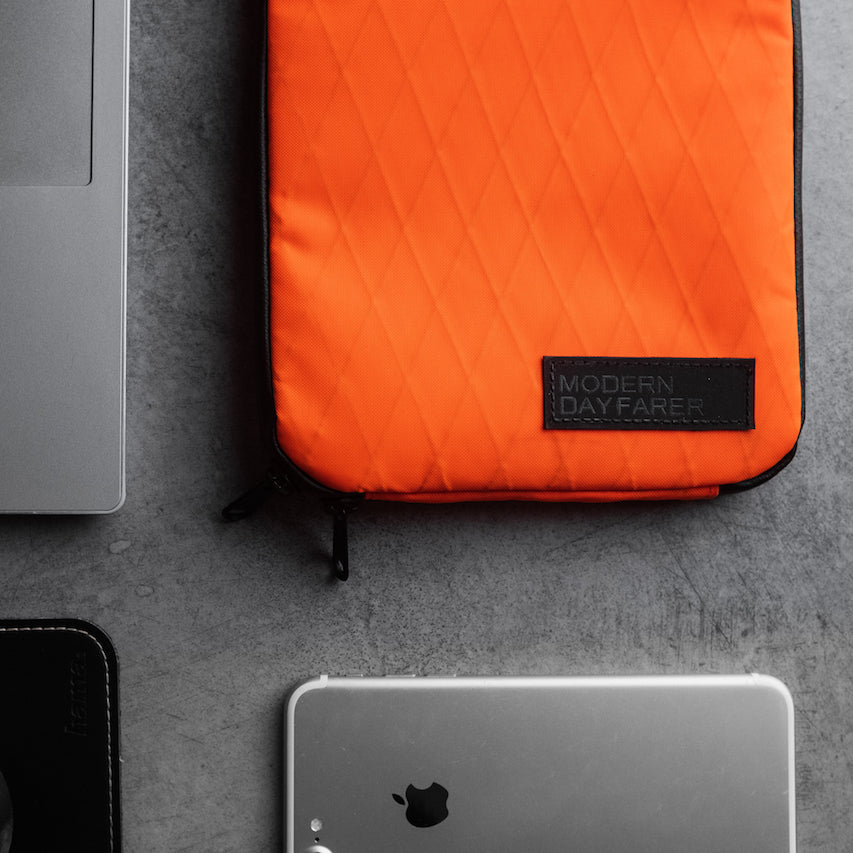 "MODERN DAYFARER Tech Pouch RVX25 - The perfect addition to your DAYFARER backpack, keeps your tech essentials organized and easy to access."